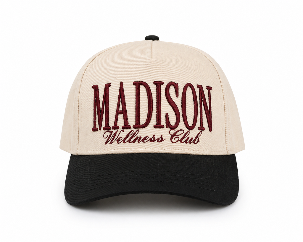 Cap with 'Madison Wellness Club' text on a white background